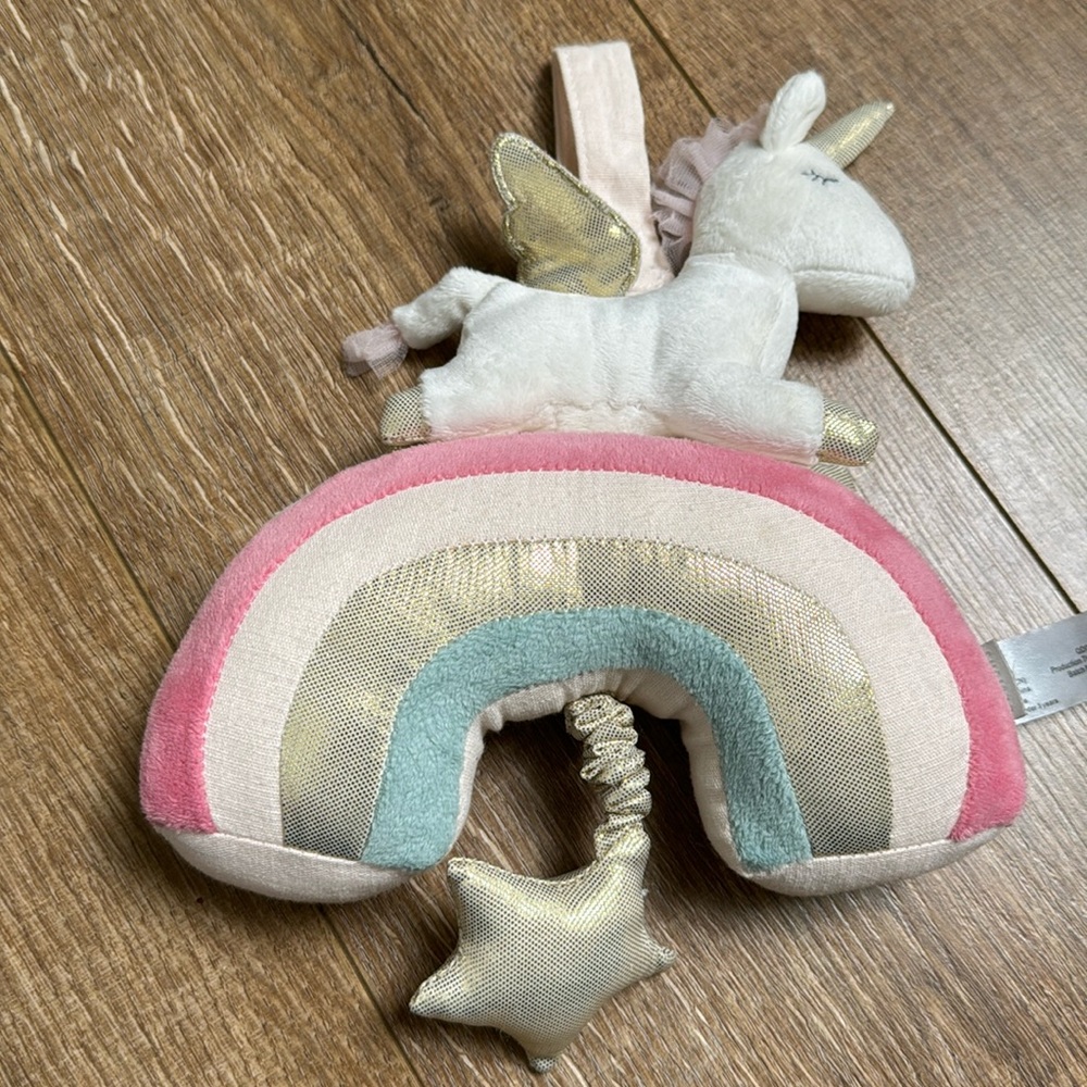 Musical unicorn crib toy